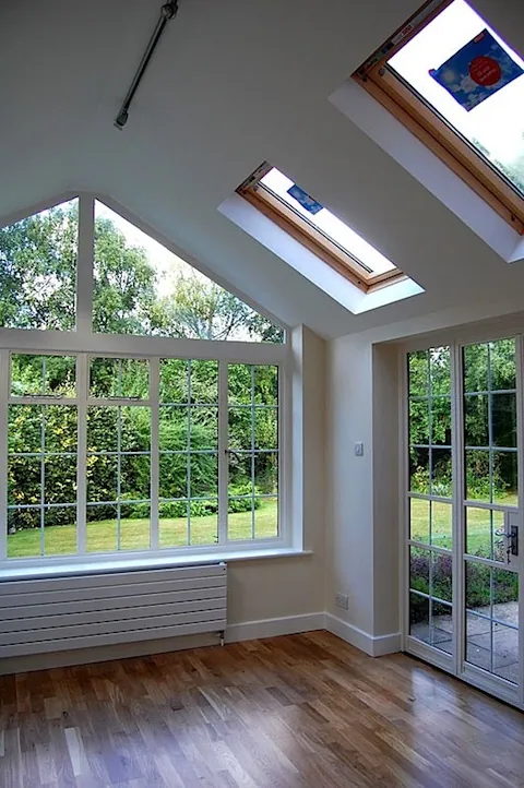 A garden room extension with roof windows and a glazed gable